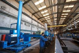 Image du Maroc Professionnelle de  Des ouvriers s'activent dans les Ateliers de STROC Industrie à Had Soualem Vendredi 20 Juin 2007, STROC est une société marocaine qui exerce son métier dans le domaine de l’ingénierie d’exécution pour les industries de procédé, les réalisations à son actif l’ont conduit à développer une expertise et un savoir-faire fort dans la construction ainsi que dans différents métiers afin d'offrir des solutions clé en main pour satisfaire au mieux ses clients. Parmi ces réalisations ont trouve : des unités de stockage et de traitement de produits liquides ou gazeux, installations de manutention et de traitement de produits en vrac ainsi que dans les domaines de Ingénierie Etudes, Génie Civil, Chaudronnerie, Structure Métallique, Tuyauterie, Montage, Maintenance, Bâtiments industriels, Logistiques, Tertiaires et Ouvrages d’Art. (Photo / Abdeljalil Bounhar) 